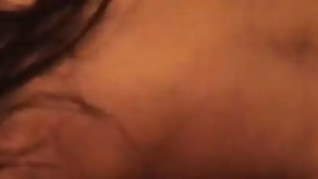 Brunette gives a gentle blowjob to a Mongolian